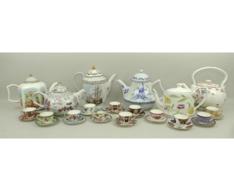 A set of twelve Royal Worcester miniature tea cups, each a reproduction of an 18th century pattern, with display shelf, 39 by