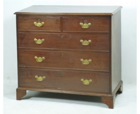 A George III mahogany chest of two short and three long graduated drawers, raised on bracket feet, 95 by 49 by 87cm high. 