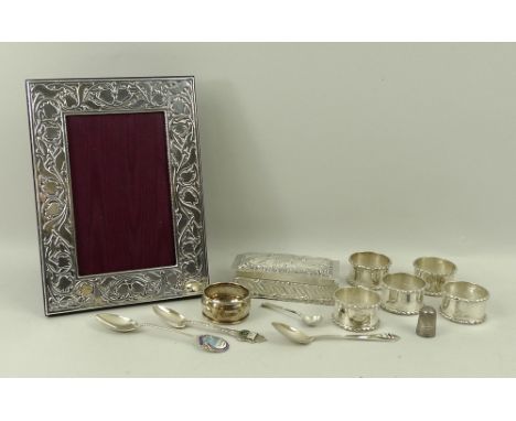 A group of silver items comprising a Victorian silver trinket box of rectangular form with embossed semi fluting and foliate 