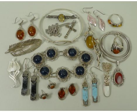 A quantity of silver jewellery including a pair of amber set earrings and two rings, silver and blue glass seven floral link 