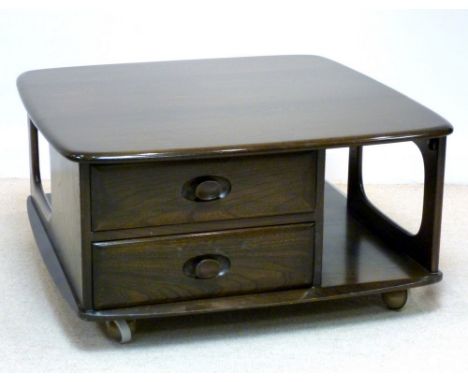 An Ercol Pandora dark stained elm coffee table with two drawers, 80 by 80 by 41cm high.