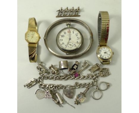 A collection of jewellery comprising a silver charm bracelet, silver bangle, a 1920's Ingersoll wristwatch, with subsidiary s