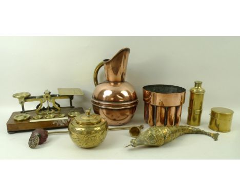 A group of brass and copper items, comprising a Chinese reticulated fish, a set of postal scales with weights, and a copper C