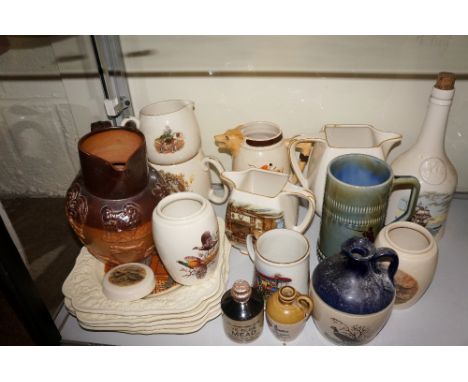 A Victorian salt glazed hunting jug, a quantity of later transfer printed jugs, tankards, plates, etc. (qty)
