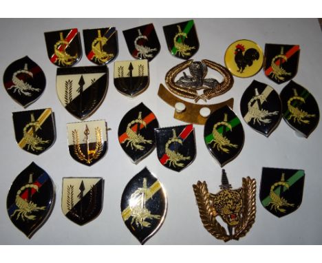Militaria, Africa, Angola, base metal and enamel badges, late 20th century, including special forces [*24]