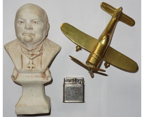 World War Two, Winston Churchill, composition bust 19cm tall; brass scratch built 's
Spitfire' with moving propeller wing spa