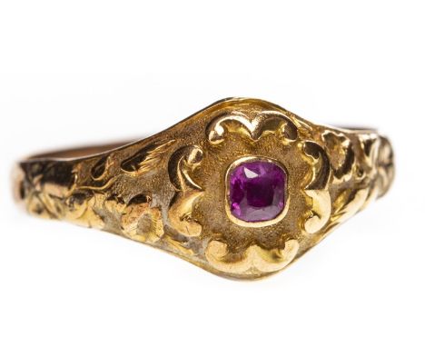 LATE VICTORIAN CREATED RUBY SET RING, the moulded bezel set with a single created ruby, decoration continued on to the should