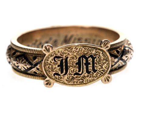 LATE VICTORIAN MOURNING RING, the oval bezel with initials 'J M' in black, the shank with engraved and black enamel decoratio