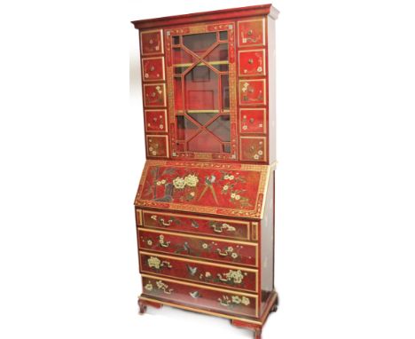 A 20thC lacquer finish Japanese bureau bookcase, the over run cornice raised above an astragal glazed door, flanked by ten dr