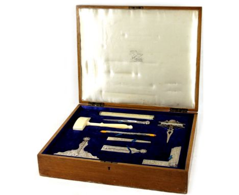 A George V silver and ivory Masonic Lodge tool set, by Toye &amp; Co, comprising various tools, ruler, ivory gavel, 20cm W, s