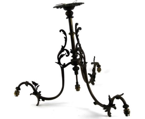 A 20thC metal framed table lamp, with three naturalistic S branches with applied leaves, on cylindrical stem and pierced flow