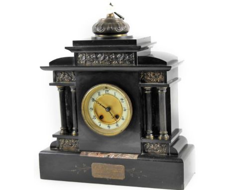 A 19thC slate and marble mantel clock, the 11cm Dia. Arabic dial before an 8-day movement in an architectural design case, 47