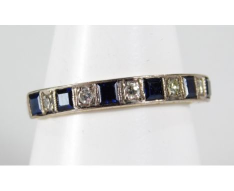 An 18ct gold sapphire and diamond half hoop eternity ring, set with square cut sapphires, and round brilliant cut diamonds in