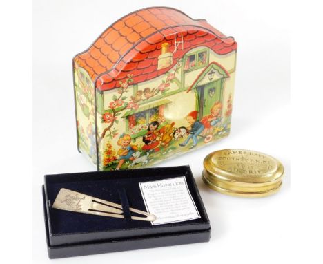 An early 20thC James Davey Aidrie brass snuff box, of oval outline, with engraved hand shaking emblem beneath, 7cm W, a Blueb
