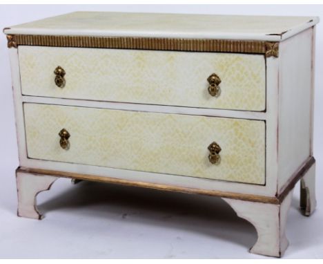 A 20thC side cabinet, the over run top raised above floral patera and two drawers, on bracket feet, 65cm H, 91cm W, 45cm D.