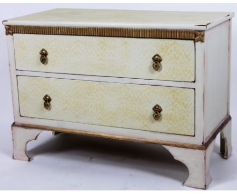 A 20thC side cabinet, the over run top raised above floral patera and two drawers, on bracket feet, 65cm H, 91cm W, 45cm D.