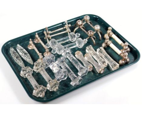 Various early 20thC silver plated knife rests, to include a pair with orb tops, 11cm W, egg shaped examples, cut glass knife 