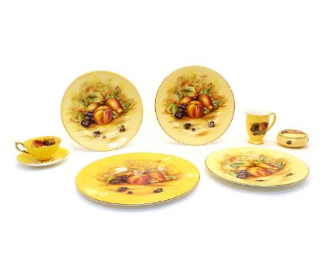 A collection of Aynsley 'Orchard Gold' teaware, comprising a set of six cups and saucers, with fruit decorated centres, sauce