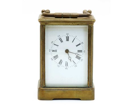 A brass carriage clock, English, early 20th century, complete with key, 14cm highCondition report: Hairline crack to dial.Mov