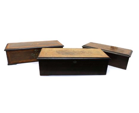 Three late 19th French cylinder music boxes, cylinders 19, 21, 27cm longCondition report: All in poor condition21cm cylinder 