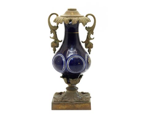 A blue glass table lamp, 19th century, with overlaid and gilt decoration within gilt metal mounts, 25cm highCondition report: