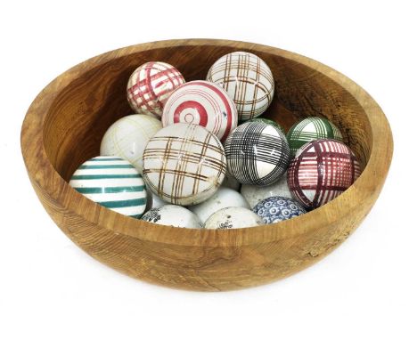 A collection of Scottish carpet bowls, 19th century, ten coloured, lined and grid pattern decorated, five, floral printed and