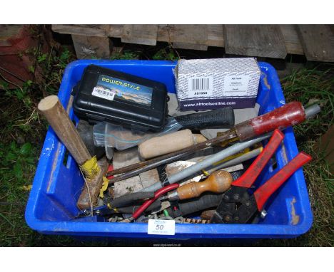 A quantity of tools to include: hammer, chisels, etc.