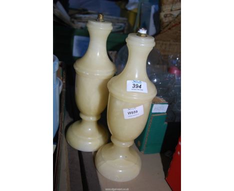 A pair of Alabaster table lamps by World of Lighting.