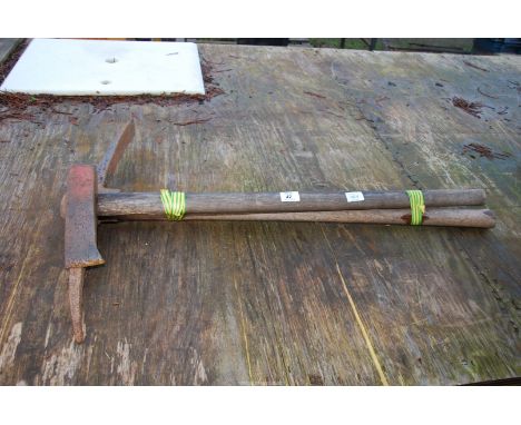 A pick axe and an axe.