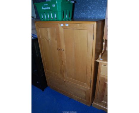 A lightwood Ash Cupboard made by Graham Amey, Crickhowell, 36" wide x 16 1/2" deep x 51" high.