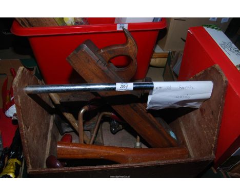 A vintage tool box including tools, hand drills, planes, etc.