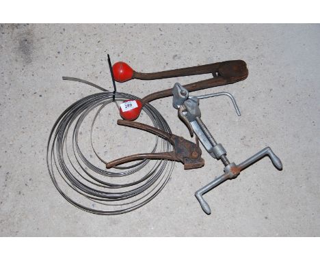 A hand banding machine plus tools.  