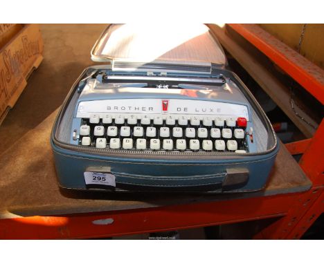 A cased "Brother" de luxe typewriter.