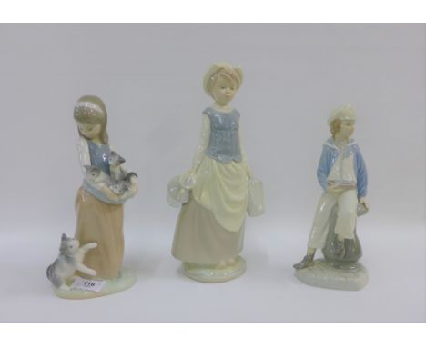 Three Lladro porcelain figures to include 'Water Carrier', etc, tallest 29cm (3)