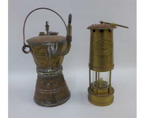 Thomas &amp; Williams Miners brass safety lamp, numbered  117602 together with a coppered metal oil lamp (2) 