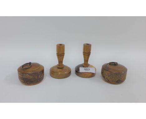 Pair of Stinkwood miniature candlesticks and a pair of Ropp wooden trinket boxes, tallest 8cm (4) 
