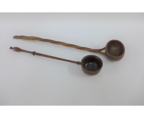 19th century treen ladle and another with twisted stem, longest 40cm (2) 