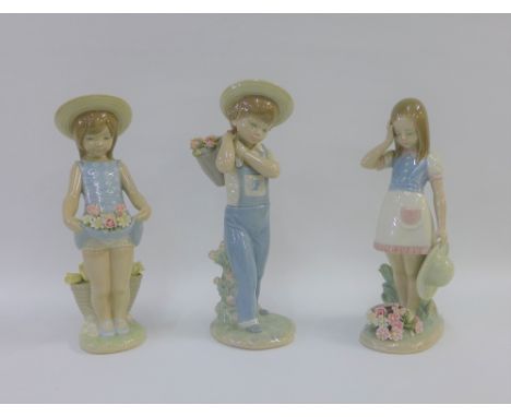Collection of three Lladro girl and boy figures, all with printed backstamps, tallest 25cm (3) 