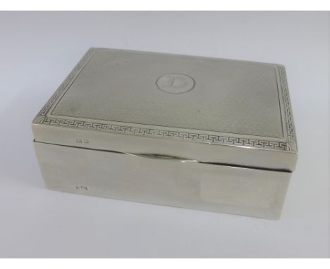 George V silver cigarette box with engine turned hinged lid and a cedar lined interior, Birmingham 1918, 13 x 9cm 