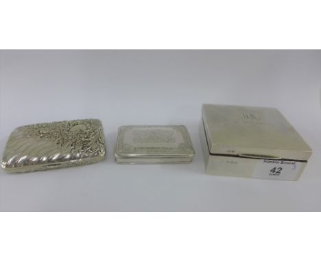 George V silver box with hinged lid and cedar lined interior, 9 x 9 cm, together with a white metal cigarette case and a whit