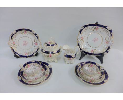 19th century English porcelain teaset comprising nine cups, five saucers, twelve side plates, sucrier, cream jug and three se