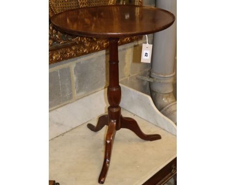 A 19th century mahogany tripod wine table, Diameter 52cm, H.70cm