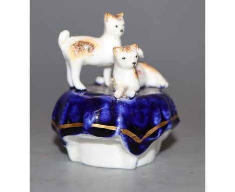 A rare Staffordshire porcelain 'kittens' inkwell, c.1840-50, H. 6cm