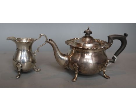 A George V silver teapot and matching cream jug, Blackmore &amp; Fletcher Ltd, London, 1921, gross 17.5oz.CONDITION: Both hav