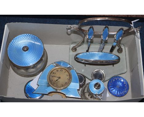 A collection of silver and blue enamel dressing table items, including a part manicure set comprising three nail files/cuticl