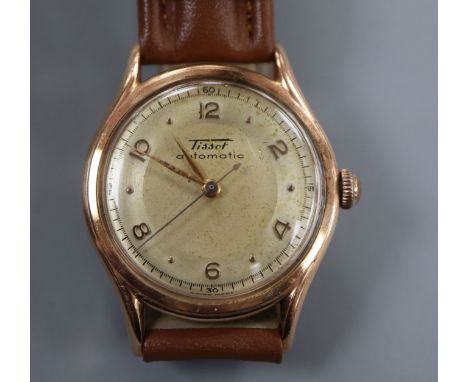A gentleman's 14k Tissot automatic wrist watch, movement c.28.5.21, on later associated leather strap.CONDITION: Case diamete