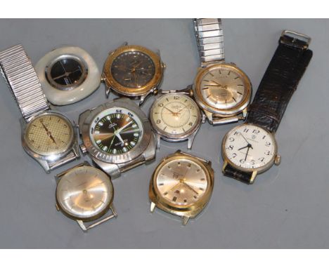 Nine assorted gentleman's wrist watches including Buren Grand Prix and Timex automatic.