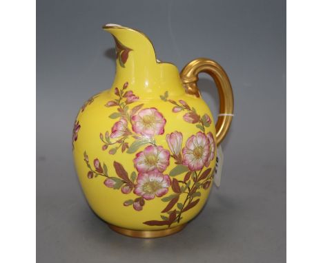 A Royal Worcester yellow ground jug, height 21cmCONDITION: Fine crazing visible to the interior and base, a hairline crack fr