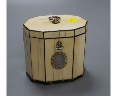 A George III decagonal ivory and tortoiseshell veneered tea caddy, height 10cm