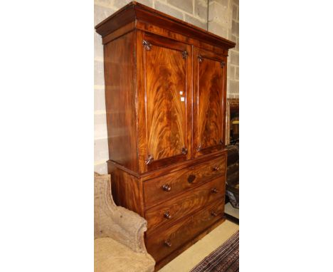 An early Victorian mahogany linen press, W.129cm, D.60cm, H.210cmCONDITION: It has been professionally cleaned and re-polishe